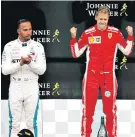  ??  ?? Perturbed: Lewis Hamilton applauds Belgian GP winner Sebastian Vettel