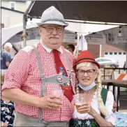  ?? PHOTO BY JESI YOST — FOR MEDIANEWS GROUP ?? Boyertown Mayor Marianne Deery and her husband Frank, Borough Council President, tap the first keg at Boyertown’s Oktoberfes­t.