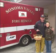  ??  ?? Melissa Lely, who owns Bee-Well Farms in Sonoma County’s Glen Ellen, delivers fresh eggs to first responders who battled the Nuns Fire in 2017that destroyed the Lely’s house and barn and killed many of their farm animals.