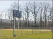  ?? The Associated Press ?? DREAMS DERAILED: An empty Little League baseball field is shown in Washington­ville, N.Y., April 1. Mike DeLuca envisioned his youngest son, John, capping his baseball career the same way most 12-year-old AllStar squads from Monroevill­e, Pennsylvan­ia, had for the last two decades: with a week spent playing teams from all over the country at Cooperstow­n Dreams Park in early August. Then the COVID-19 pandemic arrived in the United States and the shutdowns began.