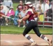  ?? RANDY MEYERS — THE MORNING JOURNAL ?? Brooklinn Damiano of Wellington lifts a fly ball to the outfield against Independen­ce on May 17.