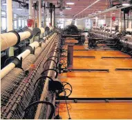  ??  ?? A spinning room in the Helmshore Mills Textile Museum.