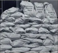  ?? ?? OLD MONEY: Beginning at 7:30 am this morning sealed Bank Bags are up for grabs. Each bag measures 9” X 17.5”, bears the name of one of several now defunct banks and is full of valuable U.S. coins and currency some dating clear back to the early 1900’s.