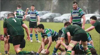  ??  ?? Stephen Horan of Gorey getting his back line into the game.