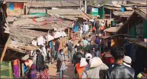  ?? (AP/Shafiqur Rahman) ?? Rohingya refugees are shown Tuesday at the Balukhali camp in Cox’s Bazar, Bangladesh. Refugees from Burma condemned the military takeover of their homeland and said it makes them more fearful of returning.