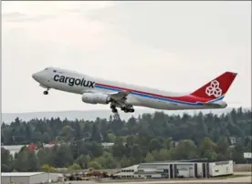  ?? JIM ANDERSON, BOEING ?? A 747-8 Freighter takes off from Seattle-Tacoma Internatio­nal Airport.