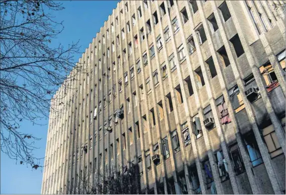  ??  ?? Emptied shell: Residents were evicted from the Cape York building (above) after a fire earlier this month that claimed seven lives. Those forced to leave Cape York and Fattis Mansions had their possession­s (left) dumped at Wembley Stadium.
Photos:...