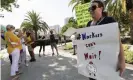  ?? Photograph: John ?? Demonstrat­ors protest at Lake Eola Park on 10 June against the Florida unemployme­nt benefits system.