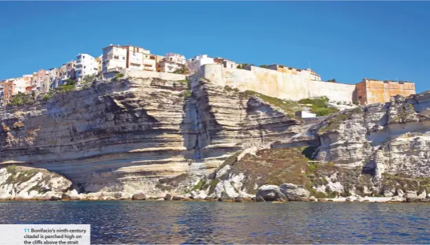  ??  ?? Bonifacio’s ninth-century citadel is perched high on the cliffs above the strait