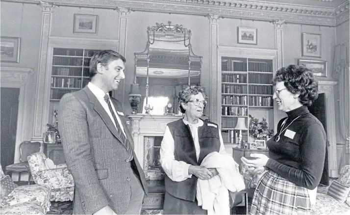  ?? ?? STATELY RETURN: Pittenweem man William Tarvit, born on October 19 1943, and his mother Sarah chat to guide Isobel McPetrie, right, in the Morning Room at Haddo House in 1987. The 18th Century stately home was an emergency maternity hospital for Glaswegian mothers during the Second World War and the Marchiones­s of Aberdeen welcomed a special pilgrimage from more than 200 war babies who returned to their birthplace. Around 1,200 babies were born at Haddo House by the time of its closure in 1945.