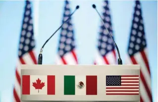  ?? - Reuters file picture ?? JOINT STATEMENT: In a joint statement, Canada and the United States said it would “result in freer markets, fairer trade and robust economic growth in our region”.