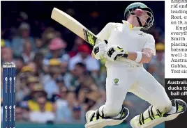  ??  ?? Australia's batsman Steve Smith ducks to avoid a short-pitched ball off England's Chris Woakes on the third day of the first cricket Ashes Test against England in Brisbane yesterday - AFP