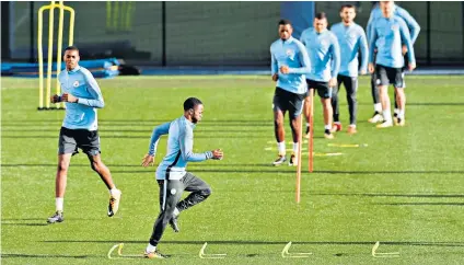  ??  ?? Leg work: Raheem Sterling trains with Manchester City yesterday