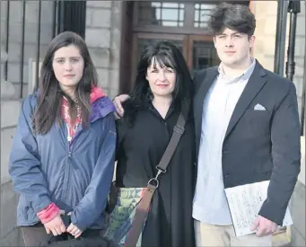  ?? COLLINS ?? Ann Marie Glennon Cully with daughter Zara and son Zane outside court.