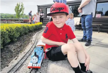  ??  ?? Jen Seaton, left, and Fiona Shields supplied refreshmen­ts and home baking and are pictured with Gordon 190518 knockbrake_09 Steam power Lewis Brown with his favourite, Thomas The Tank Engine
190518 knockbrake_08