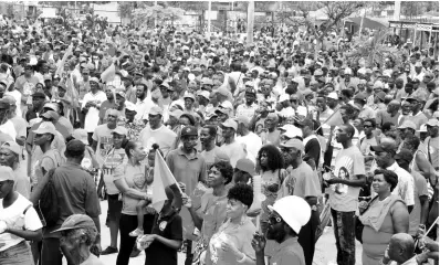  ?? FILE ?? PNP supporters outside the National Arena as they make their way inside for the party’s 80th anniversar­y national conference last September.