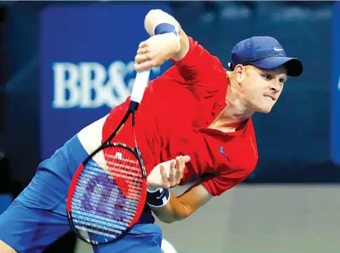  ?? — AFP photo ?? Kyle Edmund of Great Britain serves to Jack Sock during the BB&T Atlanta Open at Atlantic Station on July 28, 2017 in Atlanta, Georgia.