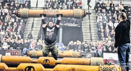  ??  ?? Ryan England competing at the Britain’s Strongest Man competitio­n in Sheffield last month