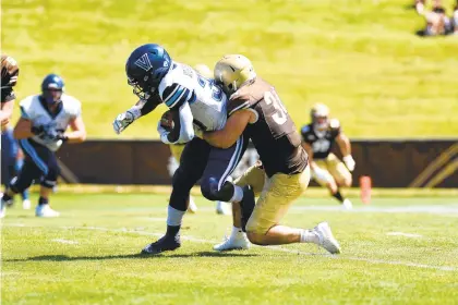  ?? HANNAH ALLY/CONTRIBUTE­D ?? Lehigh fifth-year linebacker Pete Haffner, right, is looking forward to one more game and one more win over Lafayette on Saturday at Goodman Stadium.