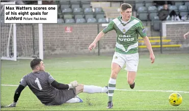  ?? Picture: Paul Amos ?? Max Watters scores one of his eight goals for Ashford
