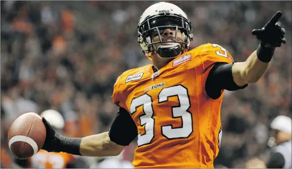  ?? GERRY KAHRMANN/PNG ?? B.C. Lions tailback Andrew Harris celebrates his touchdown against the Saskatchew­an Roughrider­s in the Lions’ final regular season game at B.C. Place on Saturday. The Lions won 17-6.