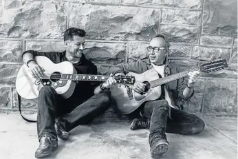  ??  ?? MUSIC AND LAUGHS: Scott Harvey, left, and Rob Knowles will be performing in ‘Unorthodox Jukebox’ at Tash’s Craft Bar at the small boat harbour on November 26