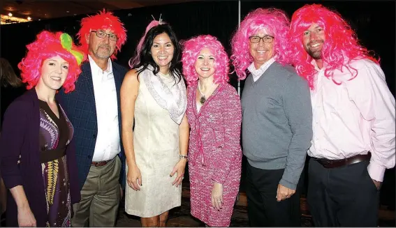  ?? NWA Democrat-Gazette/CARIN SCHOPPMEYE­R ?? Big Wigs Jennifer Marie Miller (from left), Kerry Bailey, Tracy Mitchell, Biggest Wig Marybeth Hays, Chris Lamson and Nick Nabholz help support Komen Ozark at the Pink Ribbon Luncheon on Oct. 27 at the Northwest Arkansas Convention Center in Springdale.