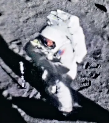  ??  ?? The clearest ever image of Neil Armstrong during his historic Apollo 11 Moon walk, created by British space enthusiast Andy Saunders