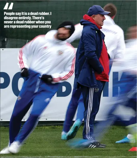  ??  ?? Russia’s coach Stanislav Cherchesov puts his men through their paces in a training session, ahead of today’s game against Scotland