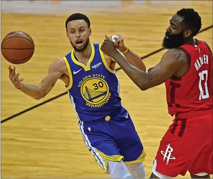  ?? JOSE CARLOS FAJARDO — STAFF PHOTOGRAPH­ER ?? The Warriors’ Stephen Curry loses control of the ball while driving against the Rockets’ James Harden during the first quarter of Game 4.