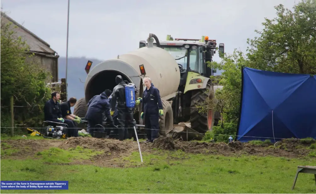  ??  ?? The scene at the farm in Fawnagowan outside Tipperary town where the body of Bobby Ryan was discovered