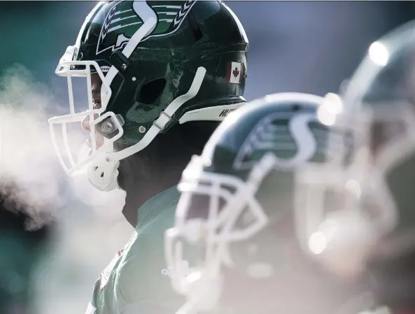  ?? BRANDON HARDER ?? Saskatchew­an Roughrider­s players braved a chilly practice Friday at Mosaic Stadium, where they’ll face the Winnipeg Blue Bombers in Sunday’s West Division semifinal.