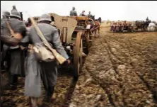  ?? ?? Right: A column of 10.5cm howitzers being towed by animal draught on the Eastern Front