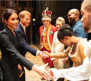  ??  ?? By royal command: Meghan and Harry meet the cast of Hamilton