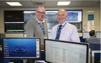  ??  ?? John Keane and Michael O’Leary at the Irish Water National Operations Management Centre in Dublin yesterday. Photo: Colin O’Riordan