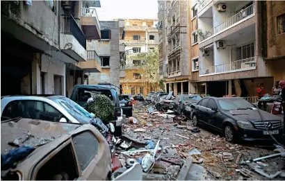  ?? AFP photo ?? The partially destroyed Beirut neighbourh­ood of Mar Mikhael on Wednesday in the aftermath of a massive explosion in the Lebanese capital. Rescuers searched for survivors in Beirut after two explosions left over 100 dead and wounded several others. —