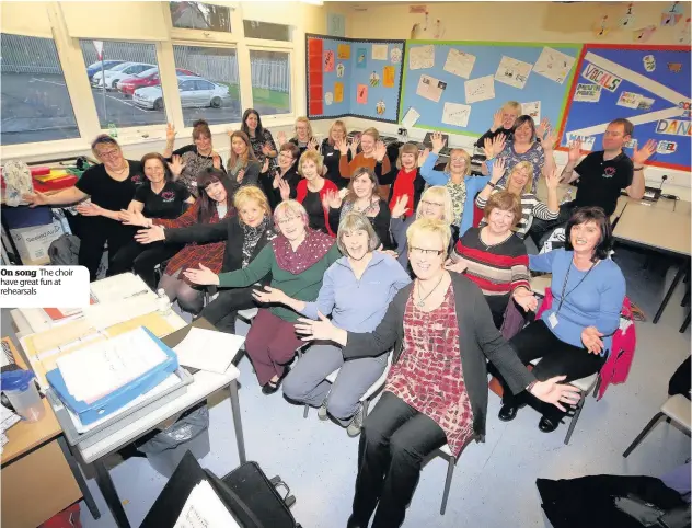  ??  ?? On song The choir have great fun at rehearsals