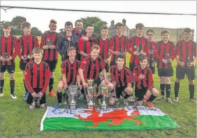  ??  ?? ● FOOTBALL: Cae Glyn United under-14s football team have had an outstandin­g season, winning the North Wales Coast Cup, beating Amlwch 4-2 in the final, lifting the Gwyrfai Cup and finishing top of the Gwyrfai League.