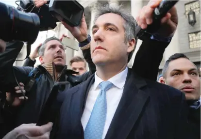  ?? JULIE JACOBSON/AP ?? Michael Cohen, who pleaded guilty Thursday to lying to Congress, walks out of federal court in New York.