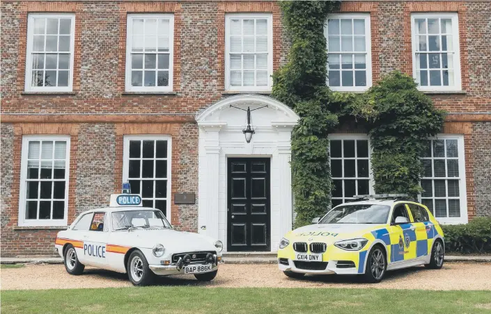  ??  ?? As part of the 50th anniversar­y celebratio­ns, an early Sussex Police patrol car was parked outside police headquarte­rs in Lewes alongside its modern BMW equivalent