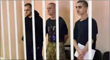  ?? (Photo AFP) ?? Les Britanniqu­es Aiden Aslin et Shaun Pinner ainsi que le Marocain Brahim Saadoun ont été jugés par un tribunal de la République séparatist­e pro-russe de Donetsk.