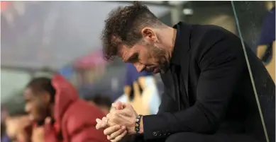  ?? PIC: SKYSPORTS ?? Down beat: Simeone sits on the bench during the game against Porto