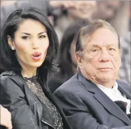  ?? Danny Moloshok
Associated Press ?? V. STIVIANO and Donald Sterling attend a Los Angeles Clippers game in 2010. His wife, Shelly, says he used shared assets to pay for gifts to Stiviano.