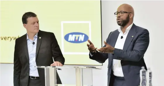  ?? | NOKUTHULA MBATHA African News Agency (ANA) ?? RALPH MUPITA, chief financial officer of MTN, and president and chief executive of MTN, Rob Shuter, at a presentati­on of annual results for the group.