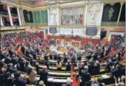  ?? REUTERS ?? Members of parliament applaud after a vote to enshrine abortion rights in the constituti­on, at the National Assembly in Paris.