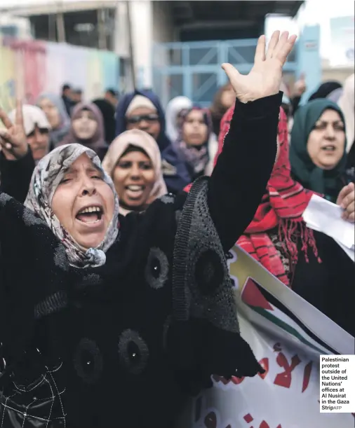  ??  ?? Palestinia­n protest outside of the United Nations’ offices at Al Nusirat in the Gaza StripAFP