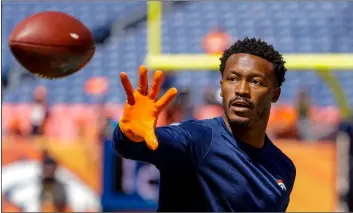  ?? AP PhOtO/JAck DemPsey ?? In this Sept. 9 photo, Denver Broncos wide receiver Demaryius Thomas (88) catches a pass before an NFL football game against the Seattle Seahawks in Denver.