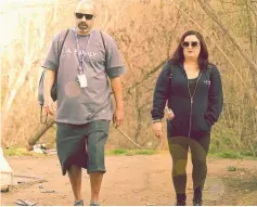  ??  ?? Staci Diner (left) and Eric Montoya, outreach coordinato­rs from LA Family Housing, visit a homeless encampment in a public park in the Van Nuys neighbourh­ood.