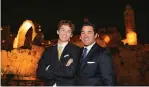  ?? (Marc Israel Sellem/The Jerusalem Post) ?? ACTOR DEAN CAIN, as incognito as Superman’s alias Clark Kent, poses with his teenage son Christophe­r in front of the capital’s Tower of David Museum last night.