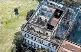  ?? BUDA MENDES/GETTY ?? A fire devastated the National Museum of Brazil Sunday night. The fire’s cause is still unknown.